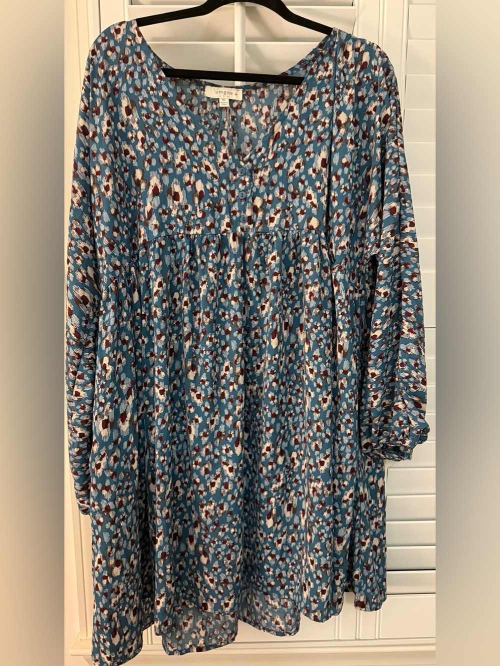Umgee teal cheetah print dress with burgundy accents. Never worn or washed.